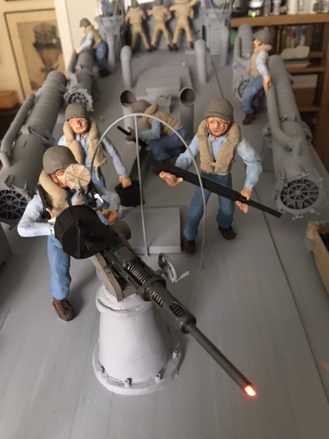 20mm gun crew firing gun 